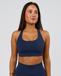 Woman wearing Flow Sports Bra - Future Navy | Model:Bianca | Size:S | Thumbnail Index: 0