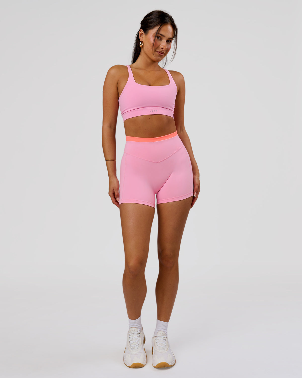 Woman wearing Fusion Contrast V-Waist High-Rise 4" Short Pockets - Pink Rose-Hyper Orange | Model:Bianca | Size:S - view 2