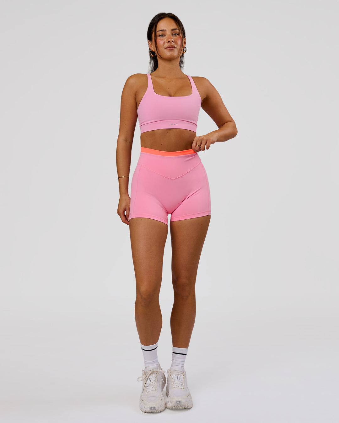 Woman wearing Fusion Contrast V-Waist High-Rise 4" Short Pockets - Pink Rose-Hyper Orange | Model:Bianca | Size:S - view 5