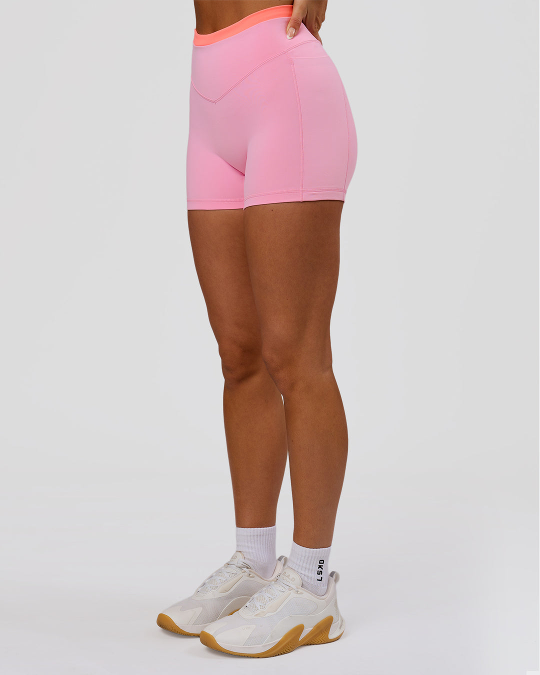Woman wearing Fusion Contrast V-Waist High-Rise 4" Short Pockets - Pink Rose-Hyper Orange | Model:Bianca | Size:S - view 10