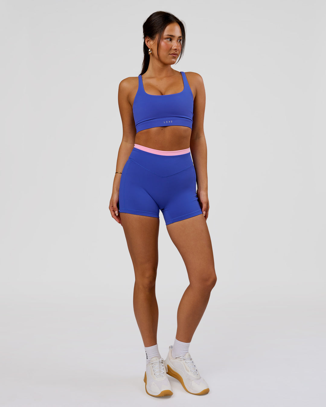 Woman wearing Fusion Contrast V-Waist High-Rise 4" Short Pockets - Power Cobalt-Pink Rose | Model:Bianca | Size:S - view 4