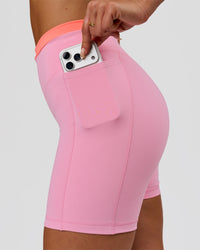 Woman wearing Fusion Contrast V-Waist High-Rise 6" Short Pockets - Pink Rose-Hyper Orange | Model:Bianca | Size:S | Thumbnail Index: 2