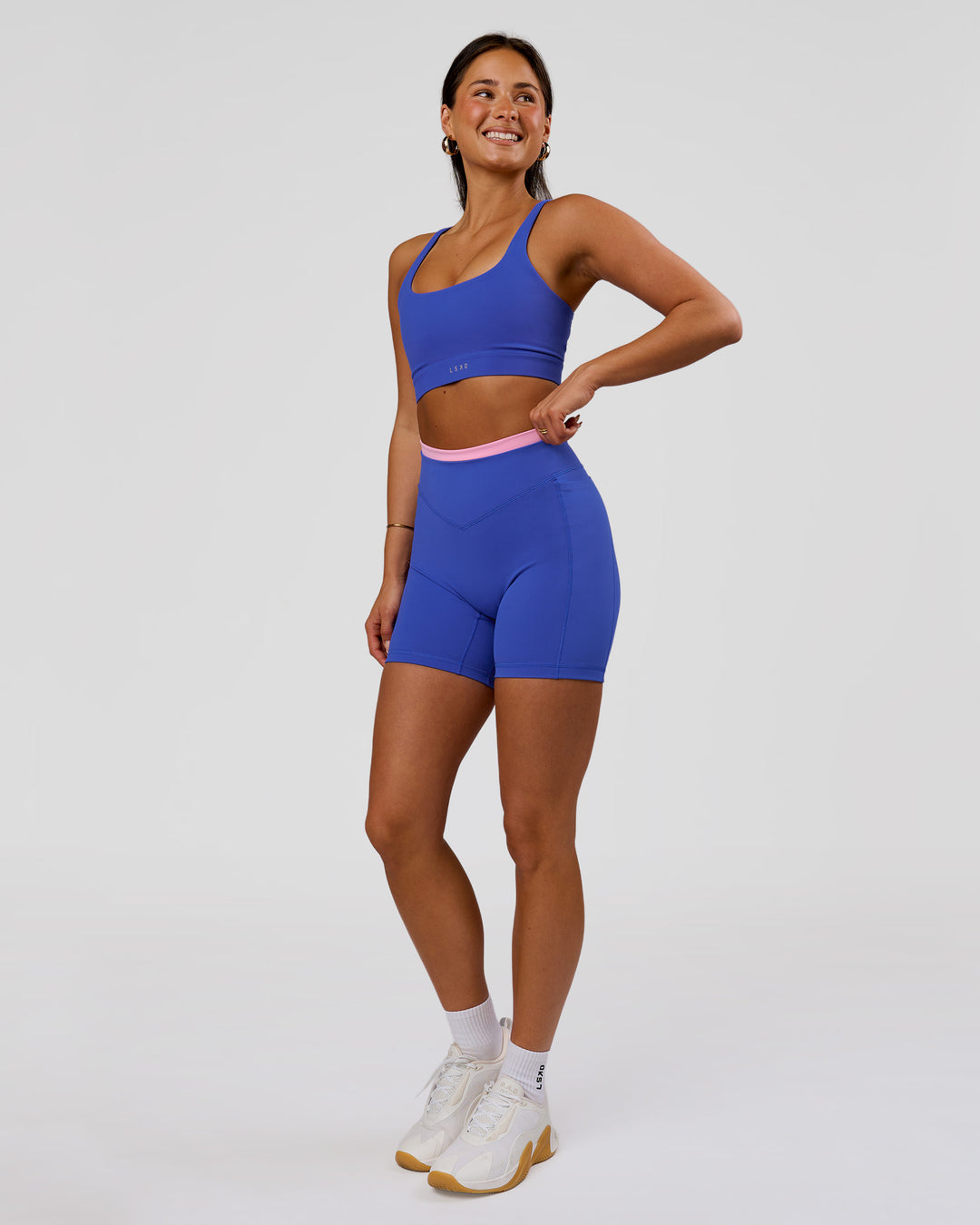 Woman wearing Fusion Contrast V-Waist High-Rise 6" Short Pockets - Power Cobalt-Pink Rose | Model:Bianca | Size:S - view 6