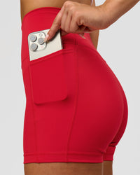 Woman wearing Fusion Ultra High-Rise 4" Short Pockets - Scarlet | Model:Bianca | Size:S | Thumbnail Index: 2