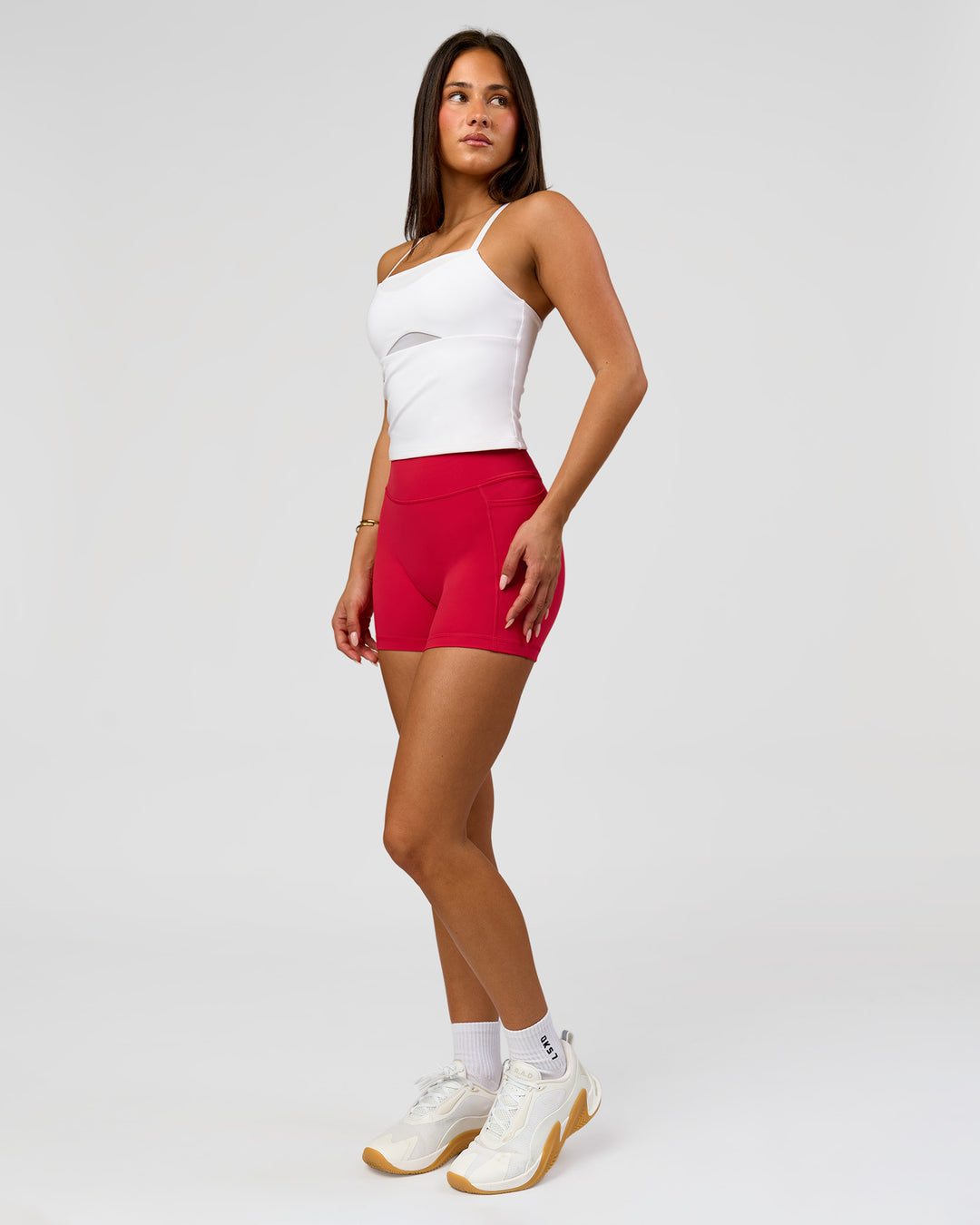 Woman wearing Fusion Ultra High-Rise 4" Short Pockets - Scarlet | Model:Bianca | Size:S - view 6