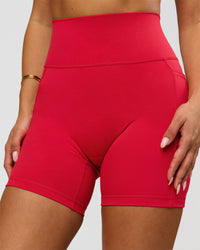Woman wearing Fusion Ultra High-Rise 6" Short Pockets - Scarlet | Model:Bianca | Size:S | Thumbnail Index: 1
