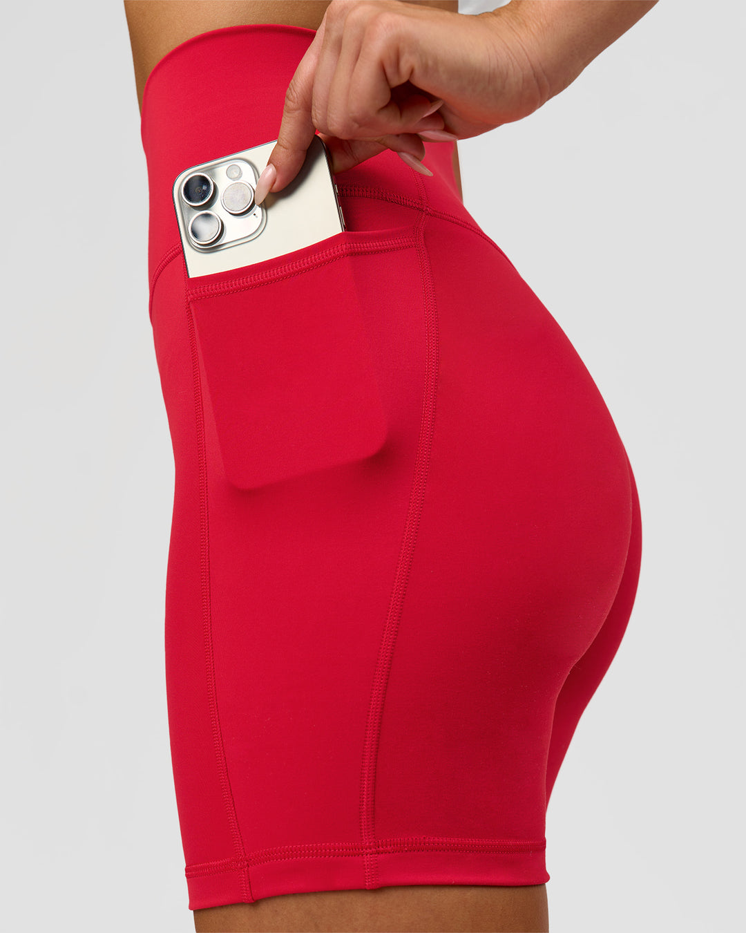 Woman wearing Fusion Ultra High-Rise 6" Short Pockets - Scarlet | Model:Bianca | Size:S - view 4