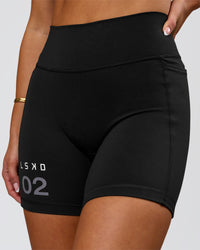 Woman wearing Fusion V-Contour High-Rise 6" Short Pockets - Black-Tech Department | Model:Bianca | Size:S | Thumbnail Index: 0