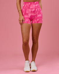 Woman wearing Fusion V-Contour Ultra High-Rise 4” Short Pockets - Radiant Pink | Model:Bianca | Size:S | Thumbnail Index: 2