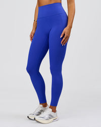 Woman wearing Fusion V-Contour Ultra High-Rise Full Length Legging Pockets - Power Cobalt | Model:Bianca | Size:S | Thumbnail Index: 1