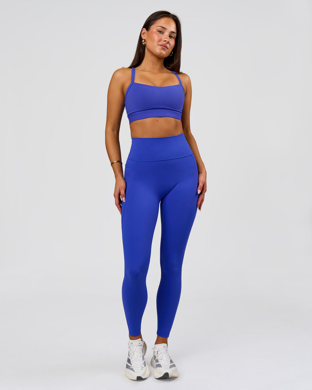Woman wearing Fusion V-Contour Ultra High-Rise Full Length Legging Pockets - Power Cobalt | Model:Bianca | Size:S - view 3