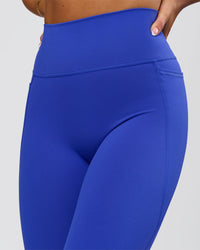 Woman wearing Fusion V-Contour Ultra High-Rise Full Length Legging Pockets - Power Cobalt | Model:Bianca | Size:S | Thumbnail Index: 3