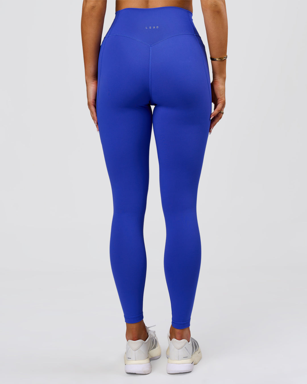 Woman wearing Fusion V-Contour Ultra High-Rise Full Length Legging Pockets - Power Cobalt | Model:Bianca | Size:S - view 6