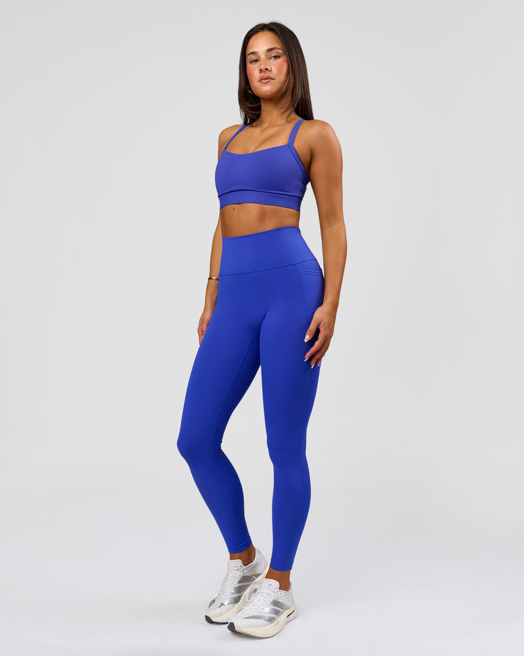 Woman wearing Fusion V-Contour Ultra High-Rise Full Length Legging Pockets - Power Cobalt | Model:Bianca | Size:S - view 7