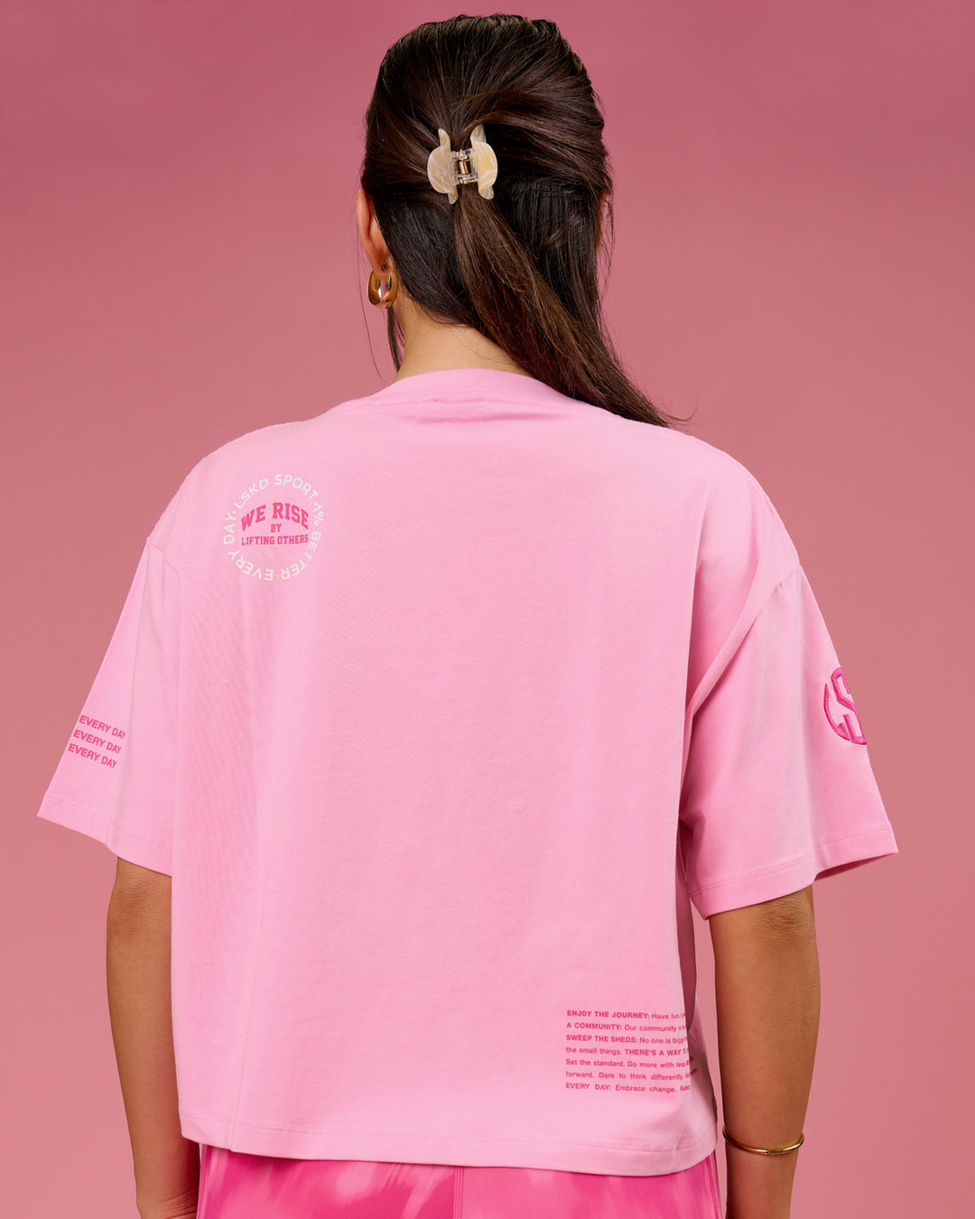 Woman wearing Go-To Heavyweight FLXCotton Graphic Skimmer Tee - Pink Rose-We Rise | Model:Bianca | Size:S - view 4