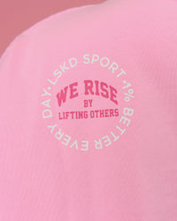 Woman wearing Go-To Heavyweight FLXCotton Graphic Skimmer Tee - Pink Rose-We Rise | Model:Bianca | Size:S | Thumbnail Index: 6