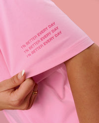 Woman wearing Go-To Heavyweight FLXCotton Graphic Skimmer Tee - Pink Rose-We Rise | Model:Bianca | Size:S | Thumbnail Index: 2