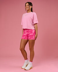 Woman wearing Go-To Heavyweight FLXCotton Graphic Skimmer Tee - Pink Rose-We Rise | Model:Bianca | Size:S | Thumbnail Index: 8