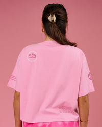 Woman wearing Go-To Heavyweight FLXCotton Graphic Skimmer Tee - Pink Rose-We Rise | Model:Bianca | Size:S | Thumbnail Index: 9