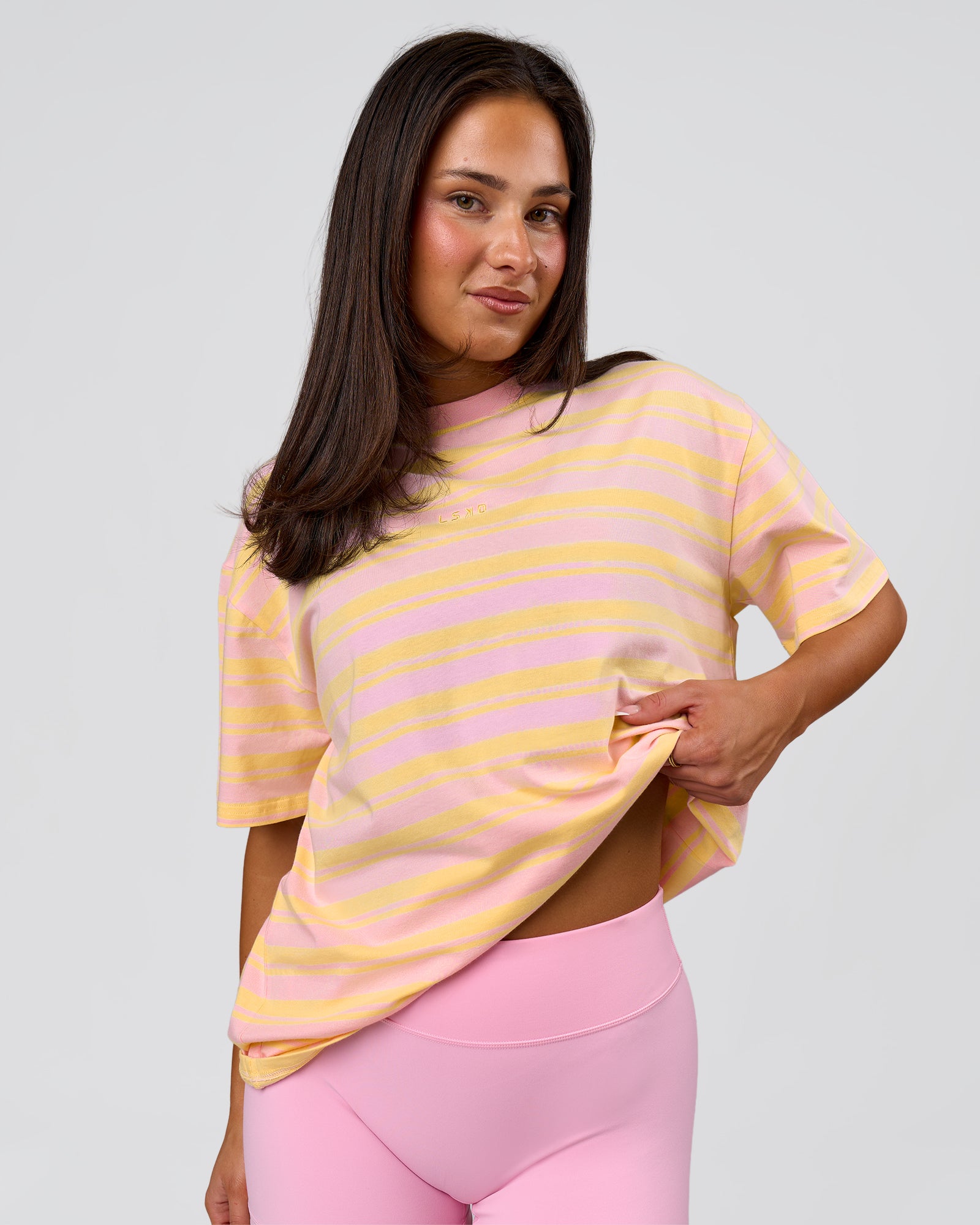 Woman wearing Go-To Shadow Stripe FLXCotton Oversized Tee - Lemon-Marshmallow | Model:Bianca | Size:S