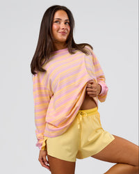 Woman wearing Go-To Shadow Stripe Long Sleeve FLXCotton Oversized Tee - Lemon-Marshmallow | Model:Bianca | Size:S | Thumbnail Index: 0