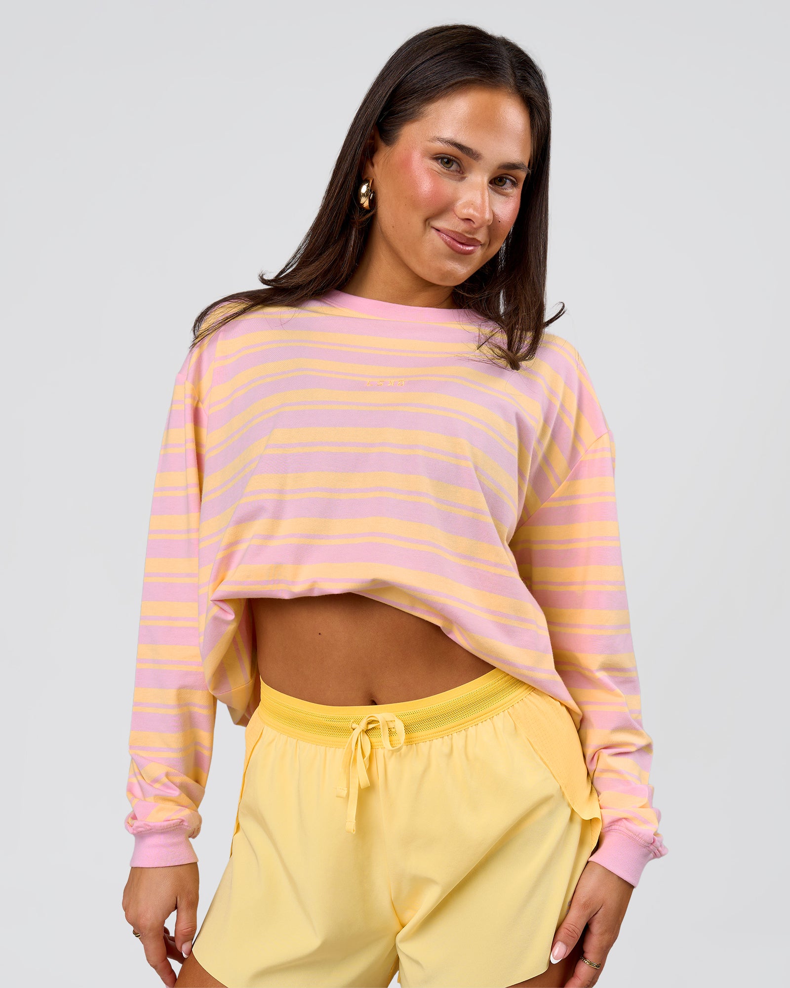 Woman wearing Go-To Shadow Stripe Long Sleeve FLXCotton Oversized Tee - Lemon-Marshmallow | Model:Bianca | Size:S