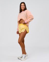 Woman wearing Go-To Shadow Stripe Long Sleeve FLXCotton Oversized Tee - Lemon-Marshmallow | Model:Bianca | Size:S | Thumbnail Index: 5