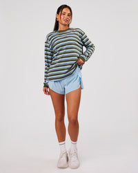 Woman wearing Go-To Shadow Stripe Long Sleeve FLXCotton Oversized Tee - Pure Olive-Open Air | Model:Bianca | Size:S | Thumbnail Index: 2
