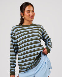 Woman wearing Go-To Shadow Stripe Long Sleeve FLXCotton Oversized Tee - Pure Olive-Open Air | Model:Bianca | Size:S | Thumbnail Index: 0