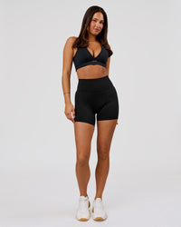 Woman wearing Luxe V-Contour High-Rise 6" Short - Black | Model:Bianca | Size:S | Thumbnail Index: 6