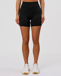 Woman wearing Luxe V-Contour High-Rise 6" Short - Black | Model:Bianca | Size:S | Thumbnail Index: 9