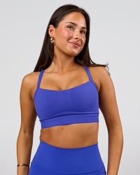 Woman wearing Momentum Sports Bra D/DD/E - Power Cobalt | Model:Bianca | Size:S | Thumbnail Index: 2