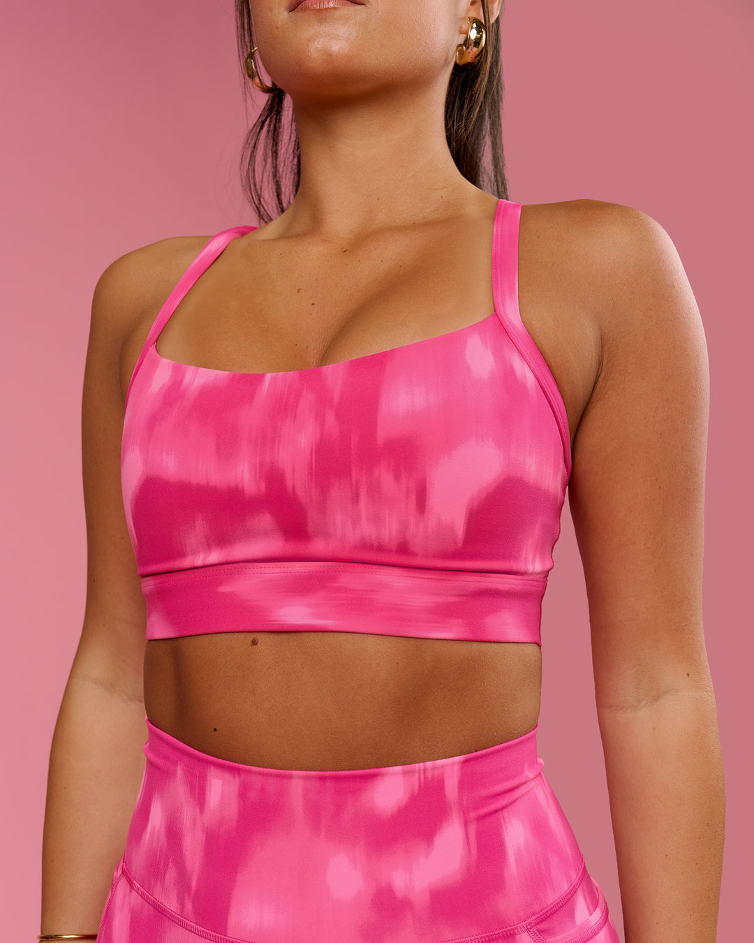 Woman wearing Momentum Sports Bra D/DD/E - Radiant Pink | Model:Bianca | Size:S - view 3