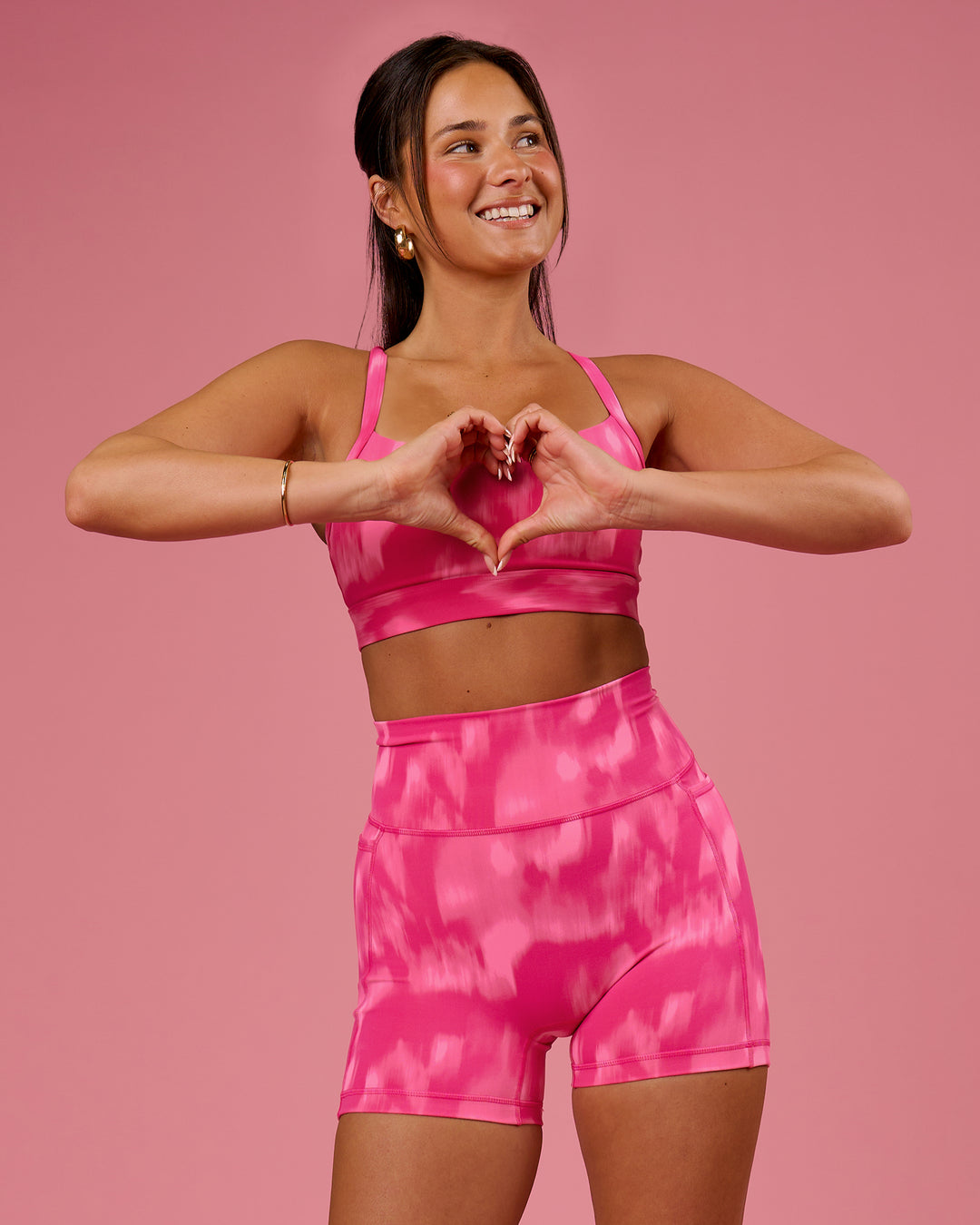 Woman wearing Momentum Sports Bra D/DD/E - Radiant Pink | Model:Bianca | Size:S - view 8