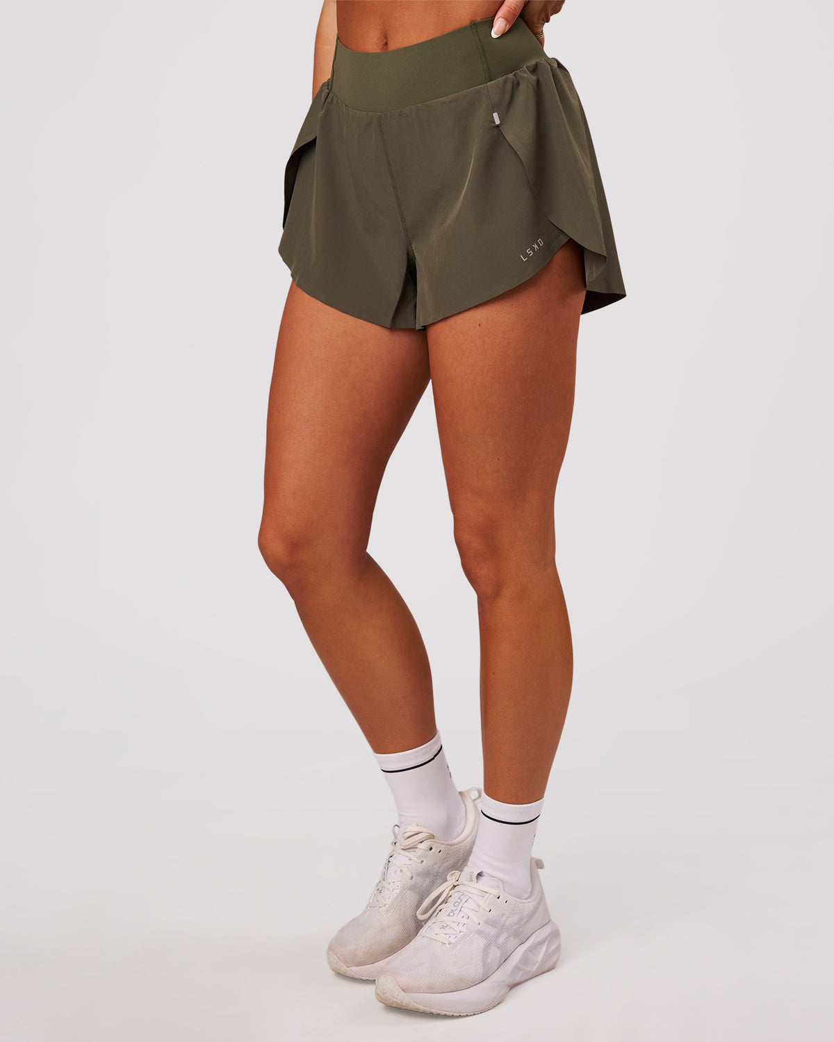 Woman wearing Pacer 3" Run Short - Pure Olive | Model:Bianca | Size:S