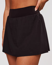 Woman wearing Pacer Skirt - Black | Model:Bianca | Size:S | Thumbnail Index: 0