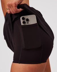 Woman wearing Pacer Skirt - Black | Model:Bianca | Size:S | Thumbnail Index: 5