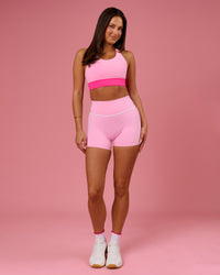 Woman wearing Pinnacle High-Rise 4" Short - Pink Rose-White | Model:Bianca | Size:S | Thumbnail Index: 5