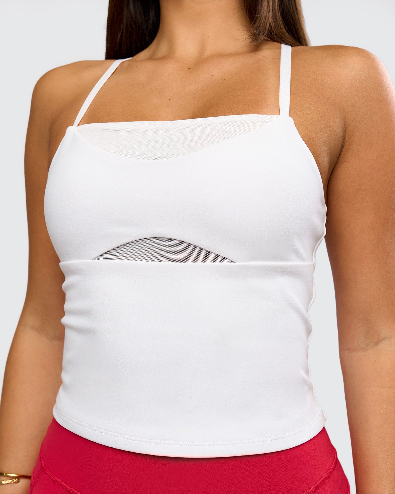 Woman wearing Podium Mesh Shelf Bra Tank - White | Model:Bianca | Size:S