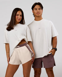 Woman wearing Run Club Unisex Oversized Heavyweight FLXCotton Tee - Off White | Model:Bianca | Size:S | Thumbnail Index: 12