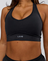 Woman wearing Stamina Amplify Sports Bra - Black | Model:Bianca | Size:S | Thumbnail Index: 0