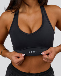 Woman wearing Stamina Amplify Sports Bra - Black | Model:Bianca | Size:S | Thumbnail Index: 6