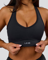 Woman wearing Stamina Amplify Sports Bra - Black | Model:Bianca | Size:S | Thumbnail Index: 7