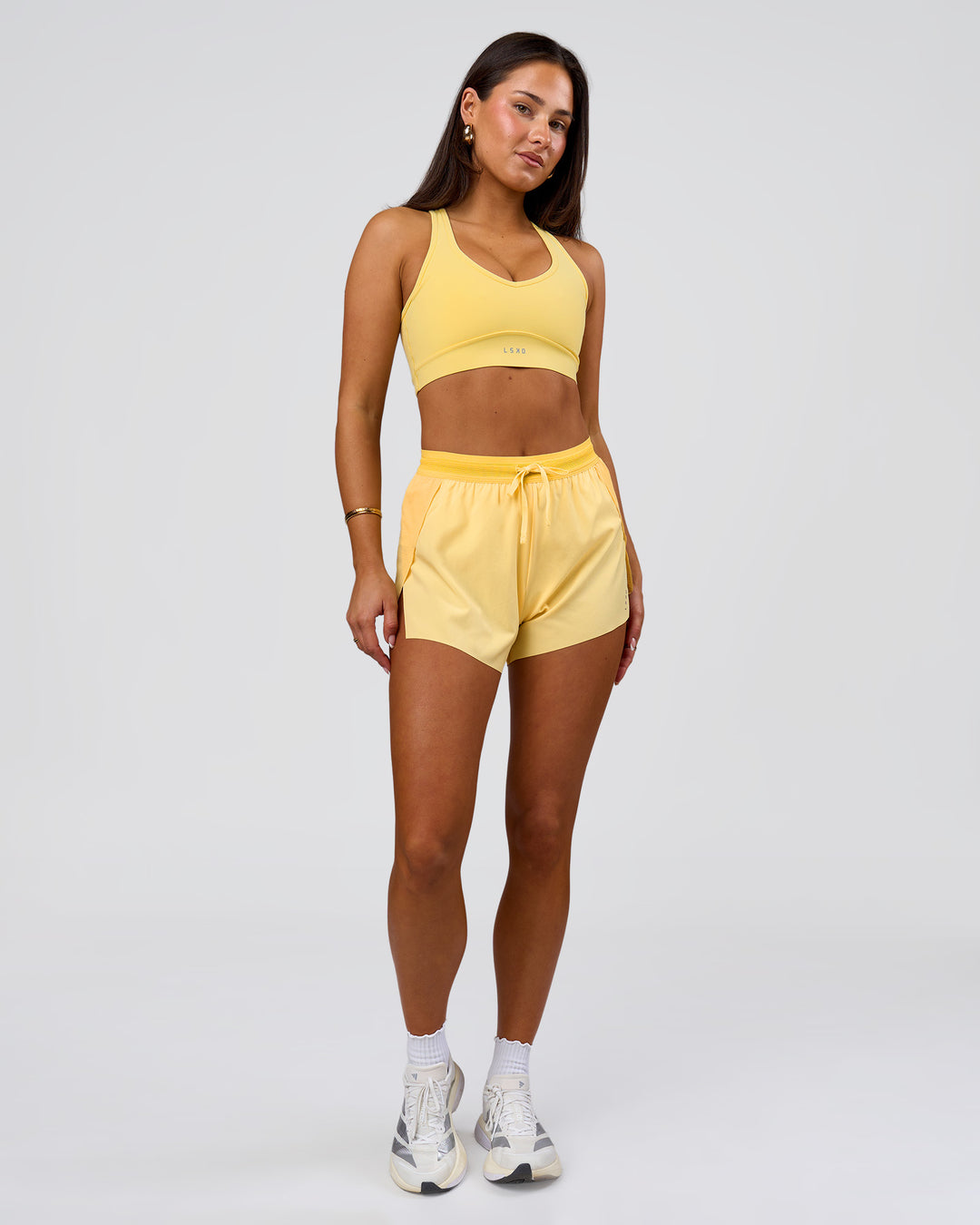 Woman wearing Stamina Amplify Sports Bra - Lemon | Model:Bianca | Size:S - view 3