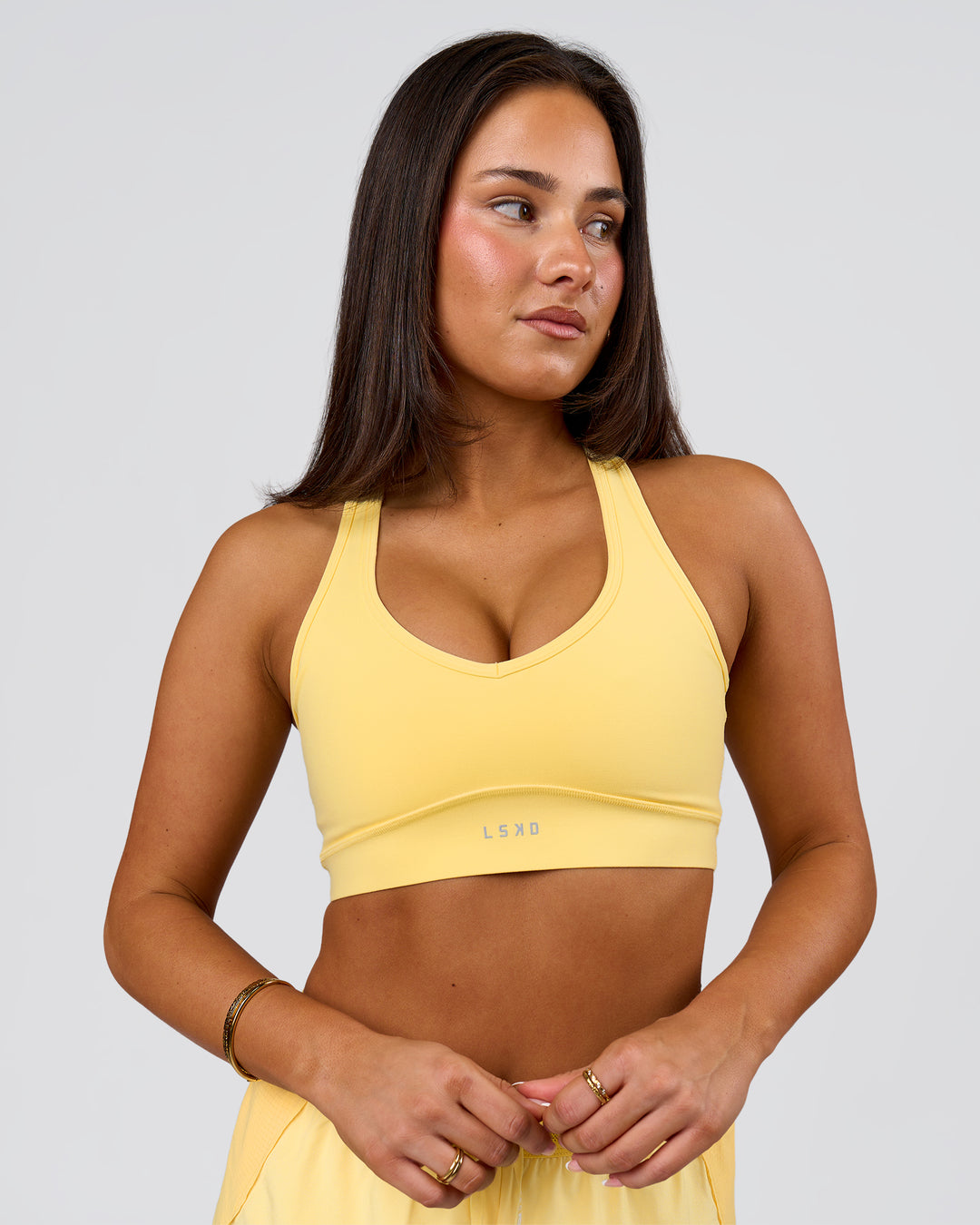 Woman wearing Stamina Amplify Sports Bra - Lemon | Model:Bianca | Size:S - view 5