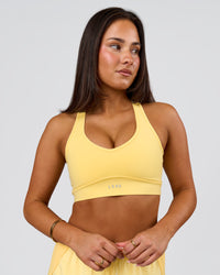 Woman wearing Stamina Amplify Sports Bra - Lemon | Model:Bianca | Size:S | Thumbnail Index: 4