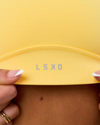 Woman wearing Stamina Amplify Sports Bra - Lemon | Model:Bianca | Size:S | Thumbnail Index: 5