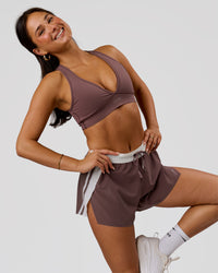 Woman wearing Stamina Sports Bra - Cocoa Powder | Model:Bianca | Size:S | Thumbnail Index: 1