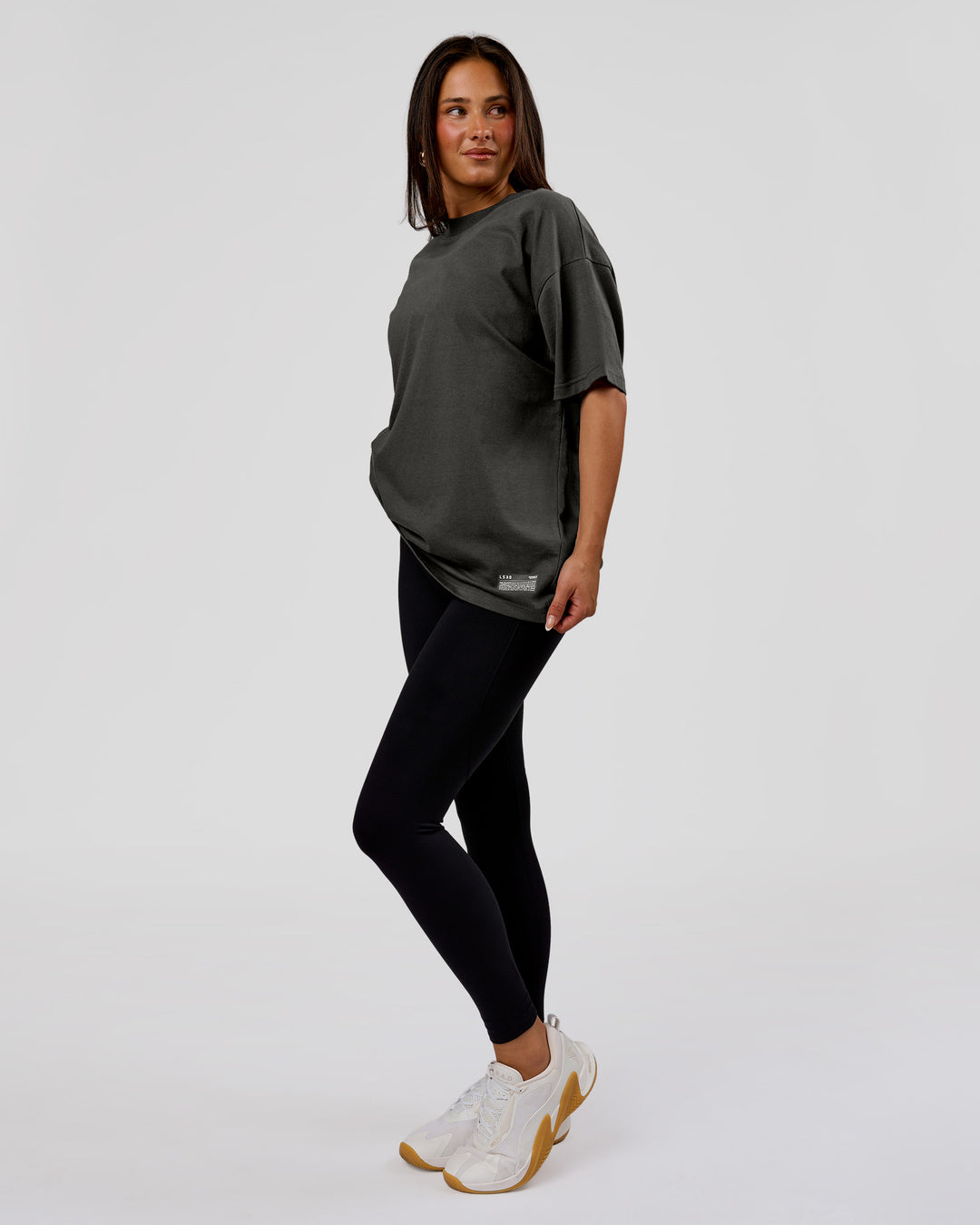 Woman wearing Strata Heavyweight Oversized Tee - Onyx | Model:Bianca | Size:S - view 11