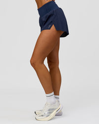 Woman wearing Tia-Clair Toomey-Orr Accelerate 3" Storage Running Short - Future Navy | Model:Bianca | Size:S | Thumbnail Index: 10
